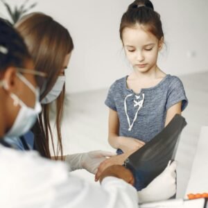 A Young Girl Having a Checkup at the Clinic